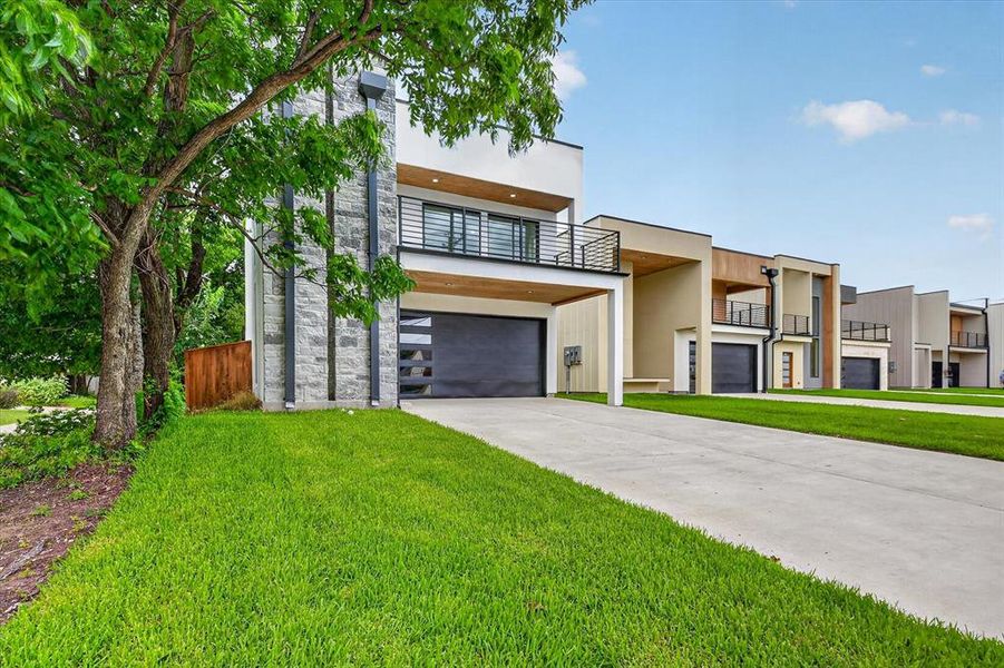 Front exterior of a new home in , Irving, TX, highlighting curb appeal (Image 2). Front exterior of a new home in , Irving, TX, highlighting curb appeal (Image 2).