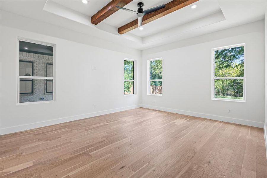 primary bedroom view overlooking back porch and backyard primary bedroom view overlooking back porch and backyard