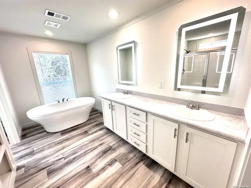 Furnished interior view inside a new home in , Lakehills (Image 11).