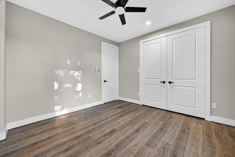 The bedroom is a clean canvas: soft tones, ample proportions, and natural light combine to create a tranquil space ready to be shaped to taste.