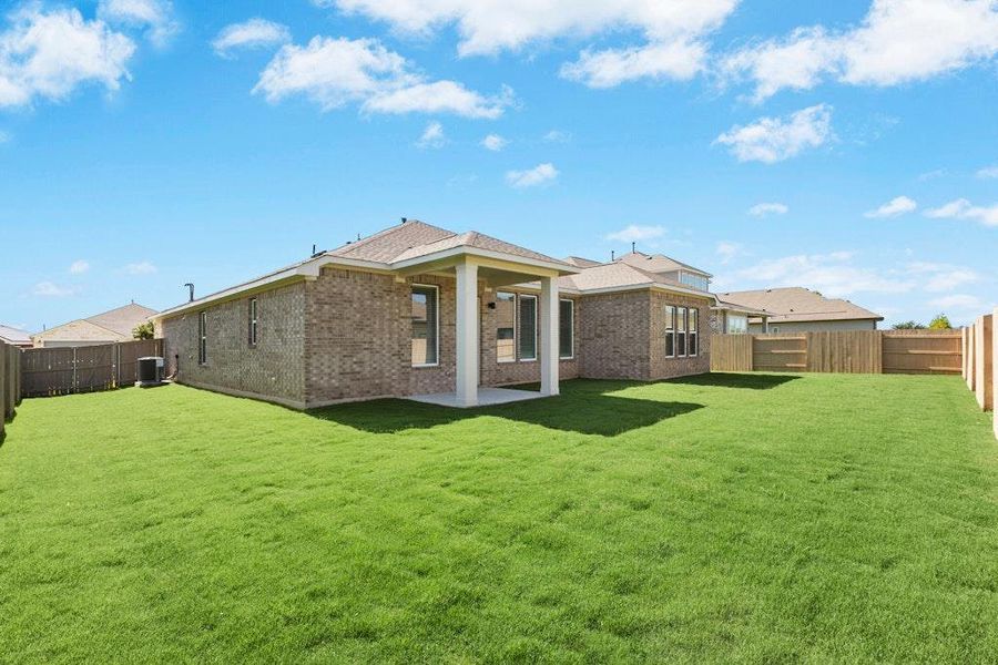 Front exterior of a new home in The Colony, Bastrop, TX, highlighting curb appeal (Image 19).
