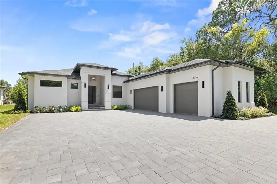 Front exterior of a new home in , Tarpon Springs, FL, highlighting curb appeal (Image 28). Front exterior of a new home in , Tarpon Springs, FL, highlighting curb appeal (Image 28).