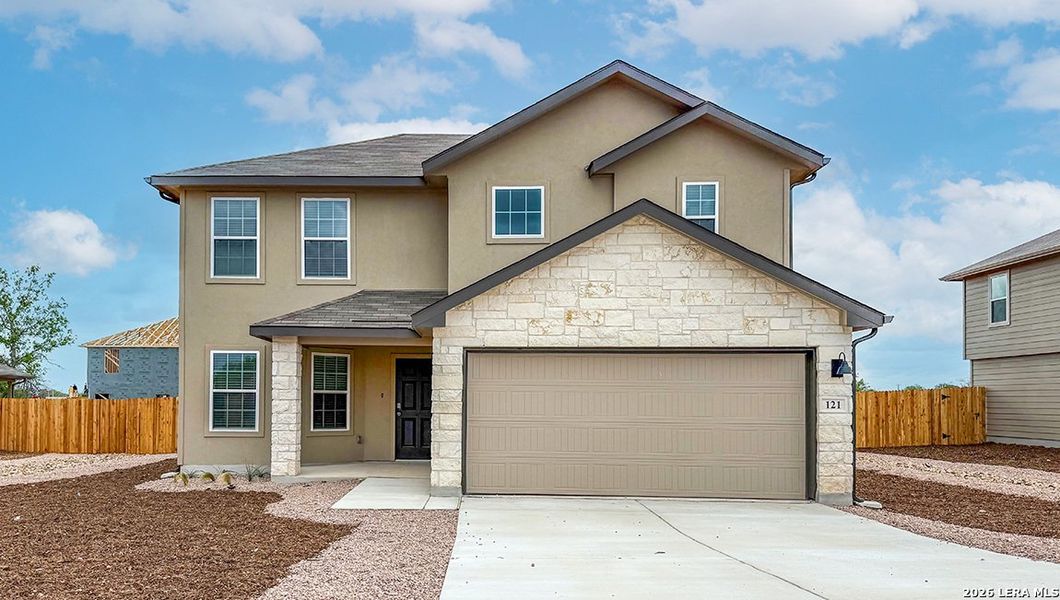 Front exterior of a new home in High Garden, Comfort, TX, highlighting curb appeal (Image 2). Front exterior of a new home in High Garden, Comfort, TX, highlighting curb appeal (Image 2).