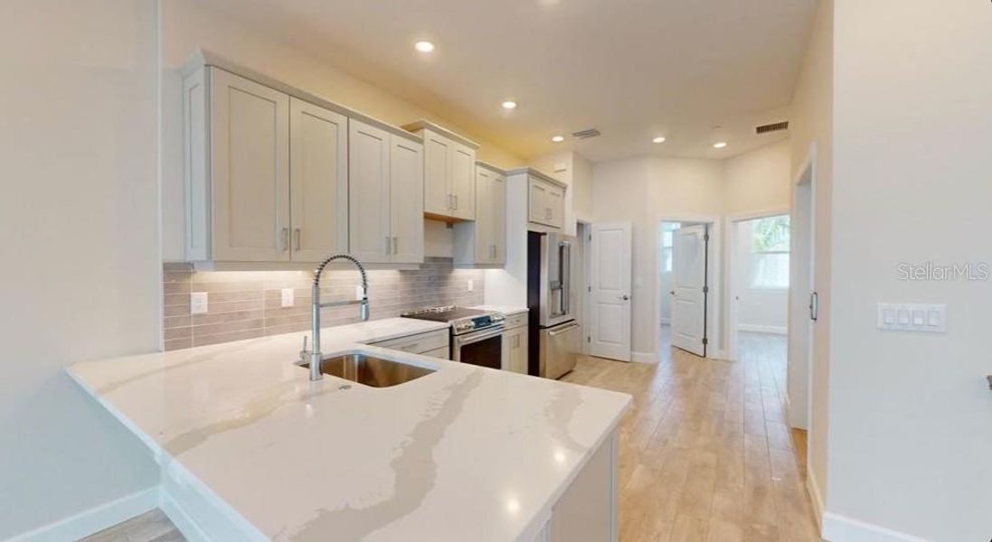 Furnished interior view inside a new home in Seahaven, Punta Gorda (Image 8). Furnished interior view inside a new home in Seahaven, Punta Gorda (Image 8).