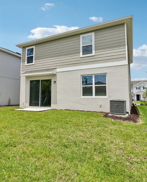 Exterior details and patio area of a home in Beresford Woods, Deland (Image 20).