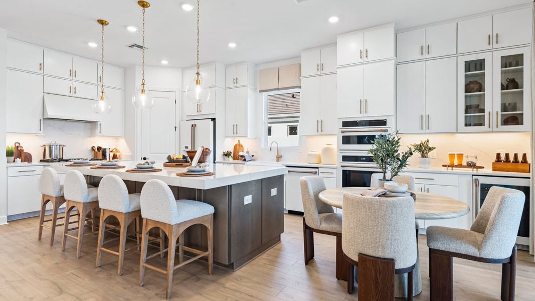 Furnished interior view inside a new home in Esplanade by the Islands, Naples (Image 15).