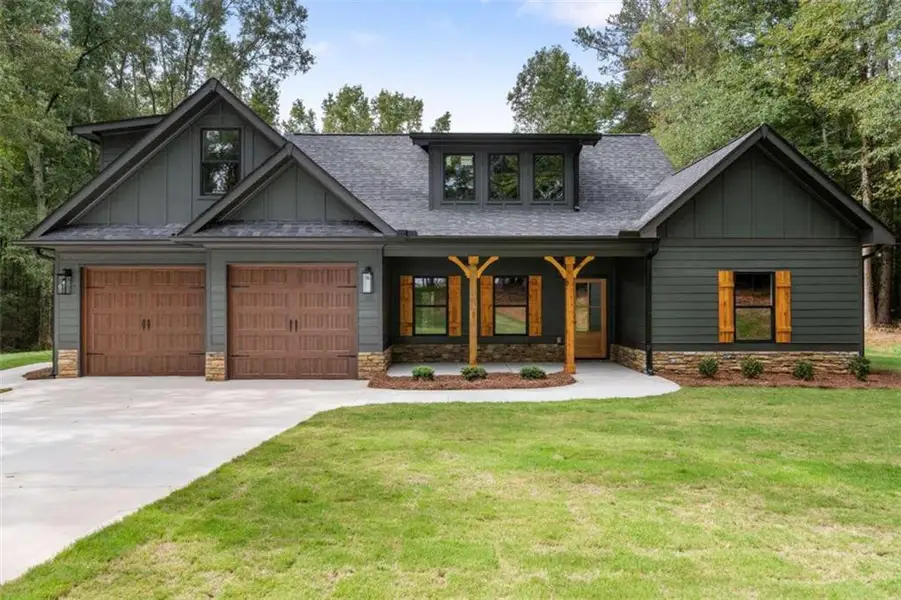 Front exterior of a new home in , Bowdon, GA, highlighting curb appeal (Image 24).