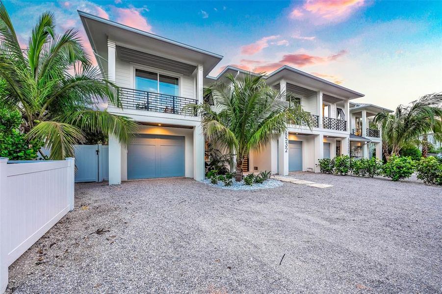 Front exterior of a new home in , Sarasota, FL, highlighting curb appeal (Image 28).