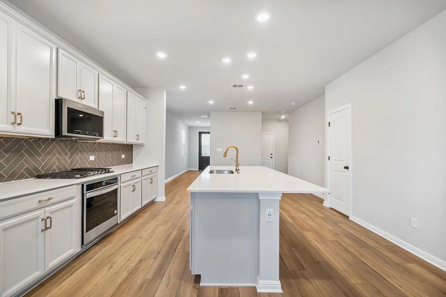Representative furnished interior of a home built from the Granbury by Ashton Woods in The Trails at Carmel, Pflugerville (Image 11).