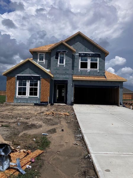 Front exterior of a new home in Westland Ranch 50' Homesites, League City, TX, highlighting curb appeal (Image 2). Front exterior of a new home in Westland Ranch 50' Homesites, League City, TX, highlighting curb appeal (Image 2).