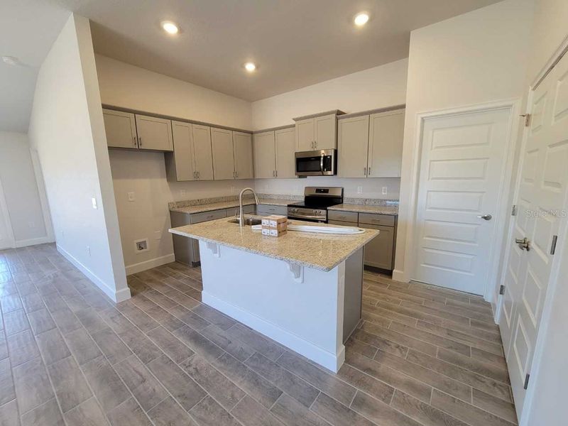 Furnished interior view inside a new home in Ocala Crossings South, Ocala (Image 5).