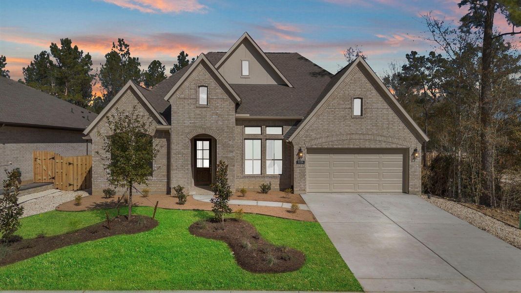 Front exterior of a new home in Colton, Montgomery, TX, highlighting curb appeal (Image 2). Front exterior of a new home in Colton, Montgomery, TX, highlighting curb appeal (Image 2).
