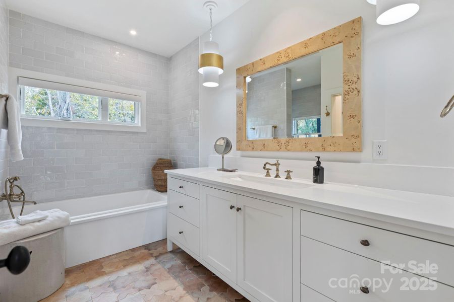Primary Ensuite Bathroom with Soaking Tub and Heated Floors