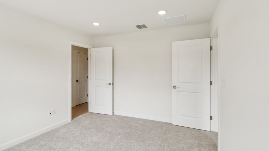 Representative furnished interior of a home built from the Carmel - Interior by DRB Homes in Cyrene at Harmony, St. Cloud (Image 16). Representative furnished interior of a home built from the Carmel - Interior by DRB Homes in Cyrene at Harmony, St. Cloud (Image 16).