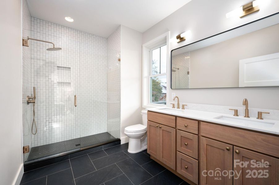 Quartz-Topped Double Vanity and Tiled, Walk-in Shower