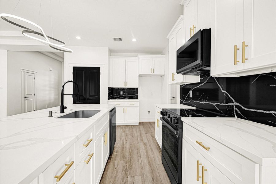 Soft close cabinets and drawers with modern pulls