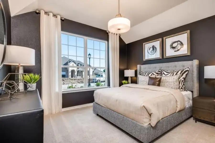 Photo of Pulte model home with same floor plan, not of actual home listed.