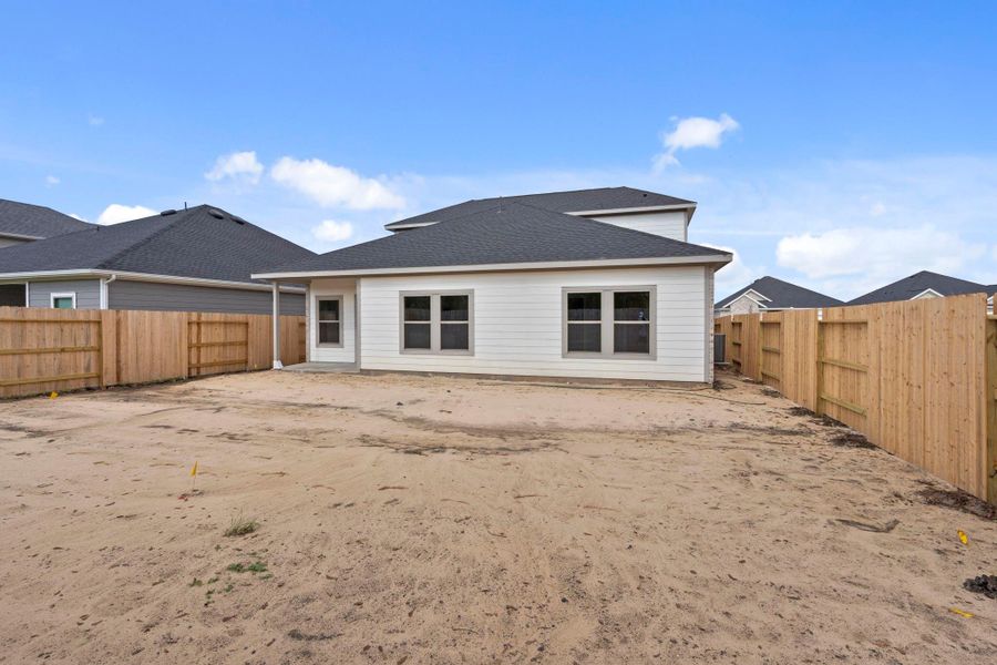 Exterior details and patio area of a home in Laurel Landing 50', Alvin (Image 17).