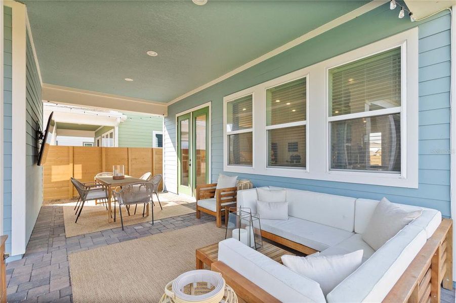 Exterior details and patio area of a home in Weslyn Park at Sunbridge (Craft Homes), St. Cloud (Image 24).