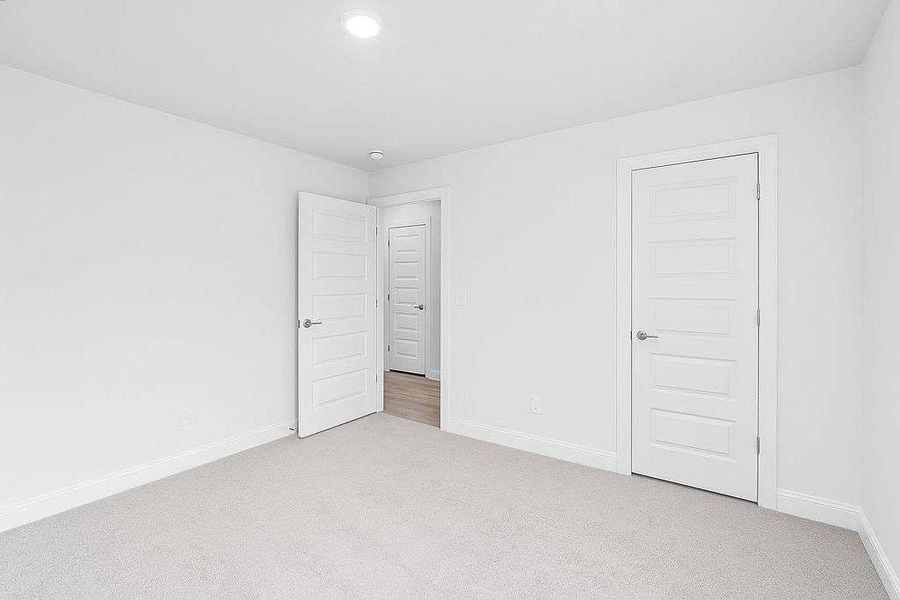Spacious, unfurnished interior of a new home in Waters Edge, Mansfield (Image 11).