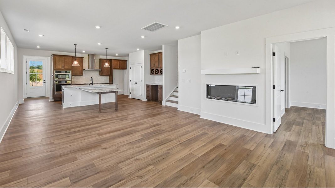 The Awaken Plan by DRB Elevate in Brook Run, Fort Mill SC - Living Space & Kitchen