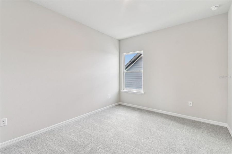 Spacious, unfurnished interior of a new home in John’s Lake North, Clermont (Image 40).