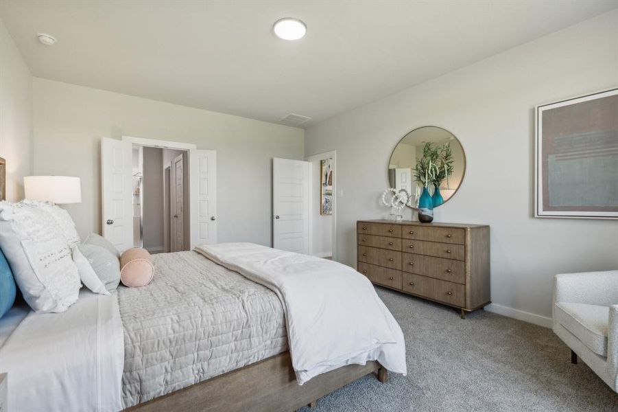 Primary Suite in the Winters home plan by Trophy Signature Homes  REPRESENTATIVE PHOTO