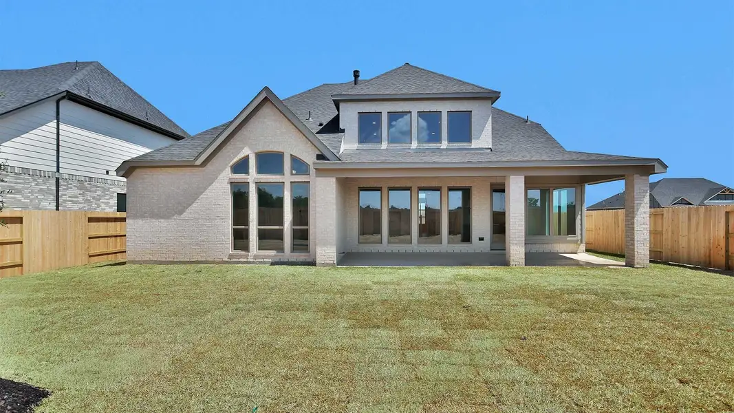Exterior details and patio area of a home in Legacy Prairie at Katy Court, Katy (Image 2).