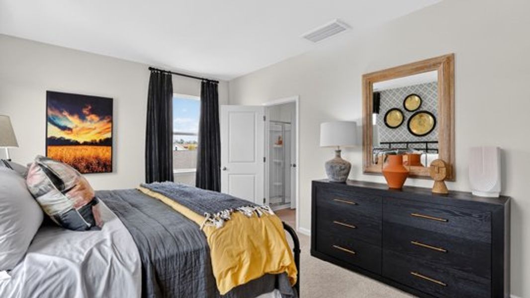 Furnished interior view inside a new home in The Townes at Madden West, Fuquay Varina (Image 12). Furnished interior view inside a new home in The Townes at Madden West, Fuquay Varina (Image 12).