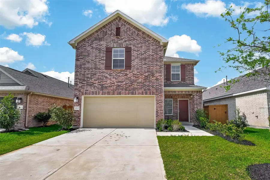 Front exterior of a new home in , Cypress, TX, highlighting curb appeal (Image 2). Front exterior of a new home in , Cypress, TX, highlighting curb appeal (Image 2).