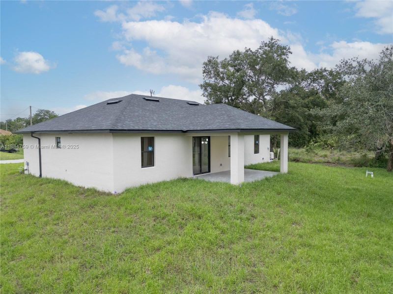 Exterior details and patio area of a home in , Lehigh Acres (Image 15).