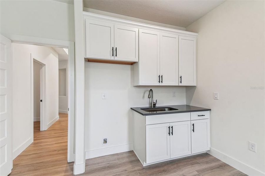 Furnished interior view inside a new home in Hidden Ridge, New Port Richey (Image 5).
