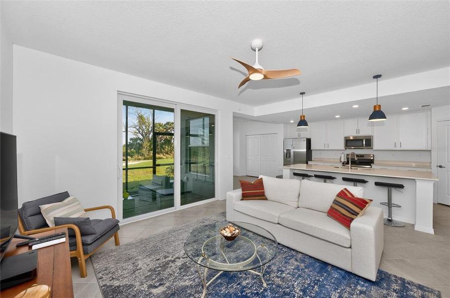 Furnished interior view inside a new home in Wellen Park Golf & Country Club, Venice (Image 36).