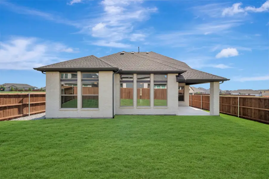 Exterior details and patio area of a home in Sandbrock Ranch, Aubrey (Image 3). Exterior details and patio area of a home in Sandbrock Ranch, Aubrey (Image 3).