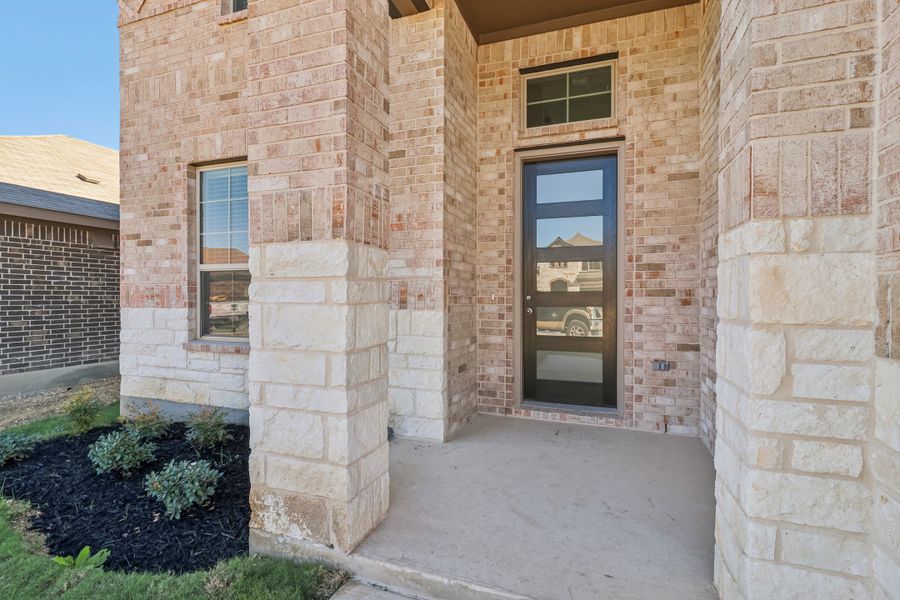 Front exterior of the Cedar floorplan at a Meritage Homes community.