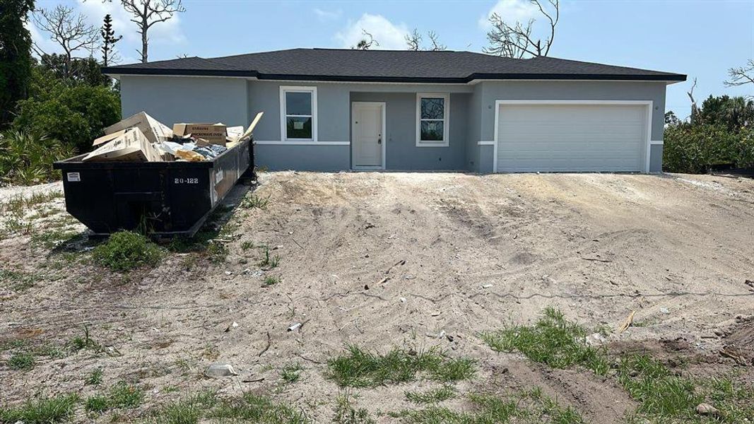 Front exterior of a new home in , Port Charlotte, FL, highlighting curb appeal (Image 18). Front exterior of a new home in , Port Charlotte, FL, highlighting curb appeal (Image 18).