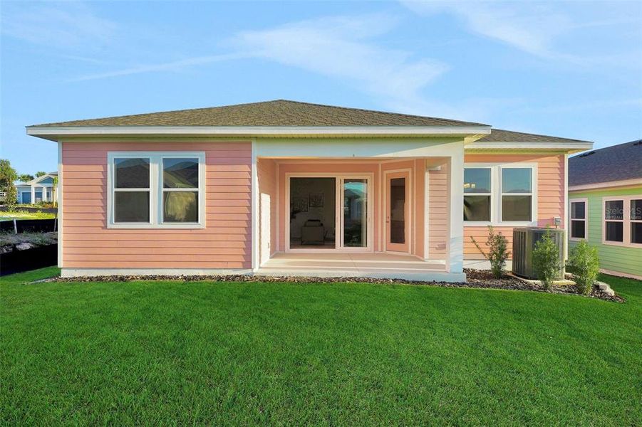 Exterior details and patio area of a home in Green Key Village, Lady Lake (Image 32).