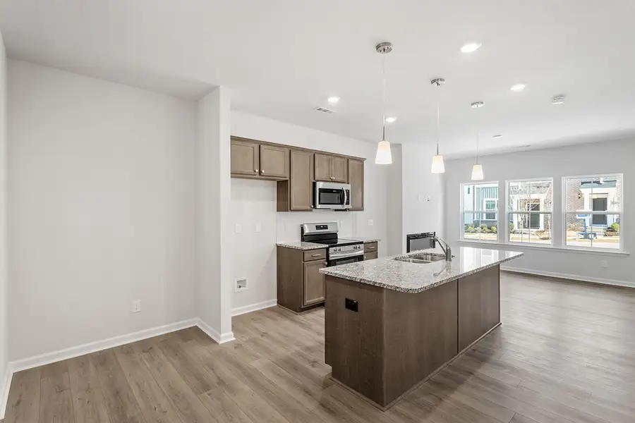 Furnished interior view inside a new home in Renaissance at White Oak, Garner (Image 3).