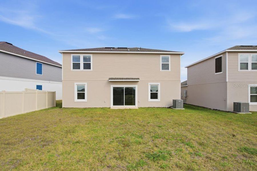 Exterior details and patio area of a home in Waterstone, Groveland (Image 3).