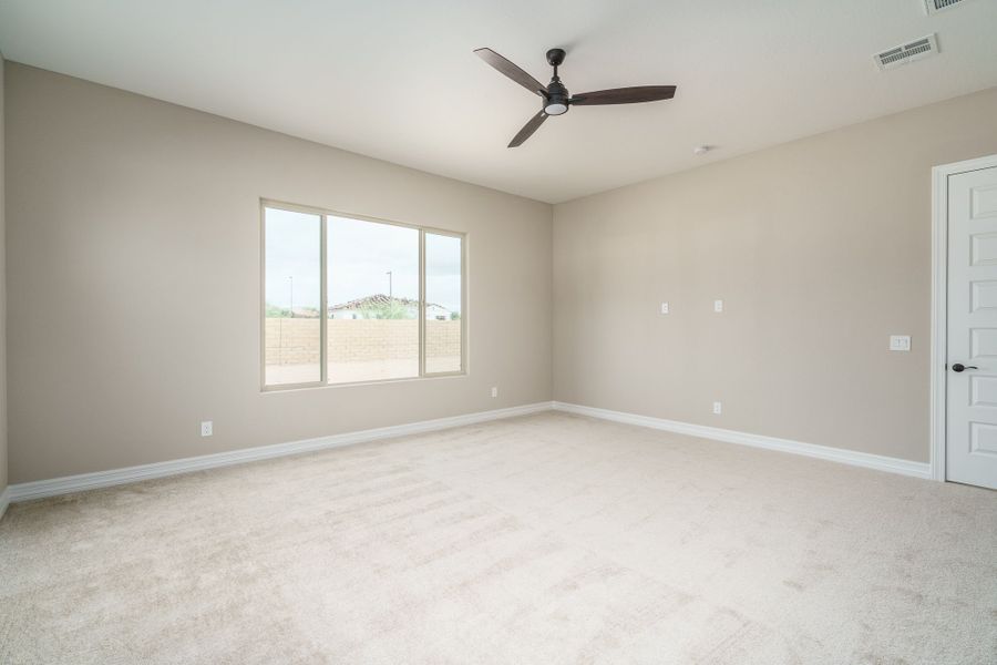Spacious, unfurnished interior of a new home in Harmony at Montecito in Estrella, Goodyear (Image 34).