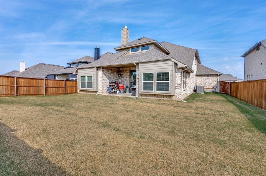 Exterior details and patio area of a home in Mockingbird Hills 60-65, Joshua (Image 2). Exterior details and patio area of a home in Mockingbird Hills 60-65, Joshua (Image 2).