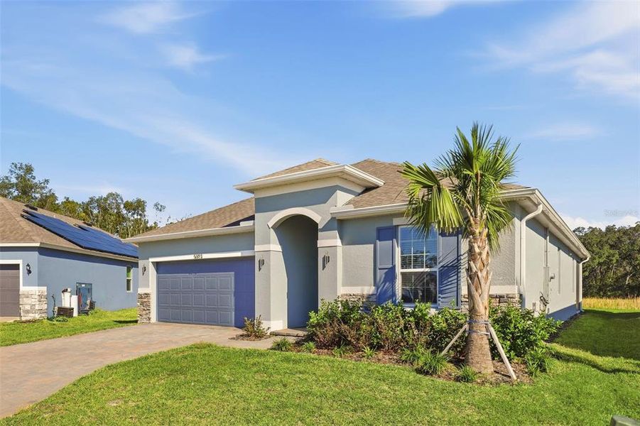 Front exterior of a new home in Lakewood Park, Deland, FL, highlighting curb appeal (Image 1). Front exterior of a new home in Lakewood Park, Deland, FL, highlighting curb appeal (Image 1).