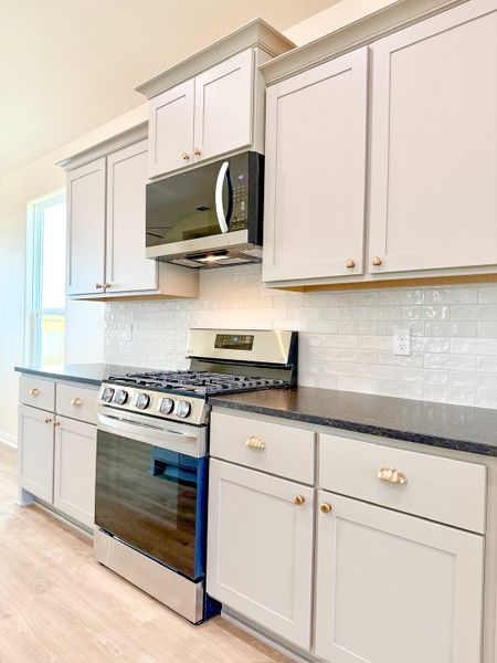 Furnished interior view inside a new home in TerraVista, Victoria (Image 8).