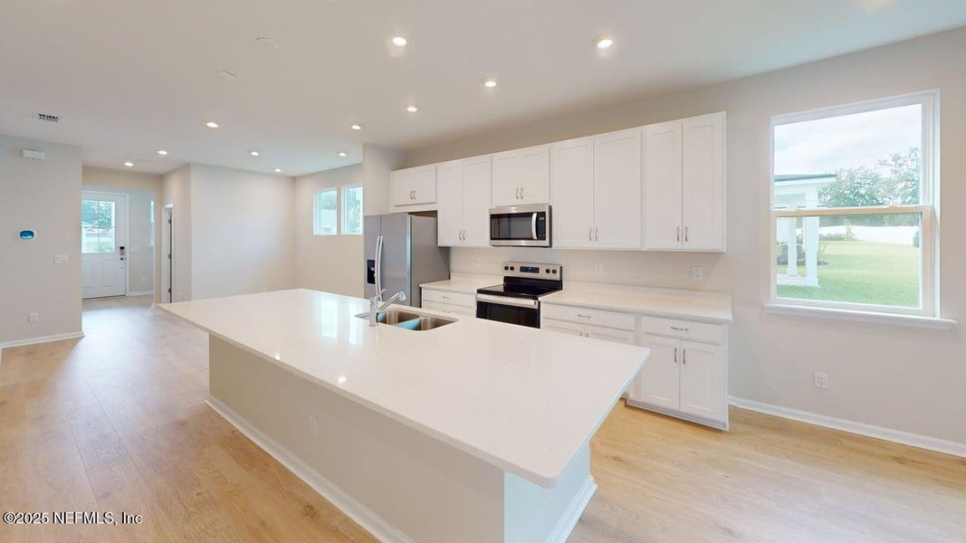 Furnished interior view inside a new home in Sandridge Hills, Green Cove Springs (Image 6).