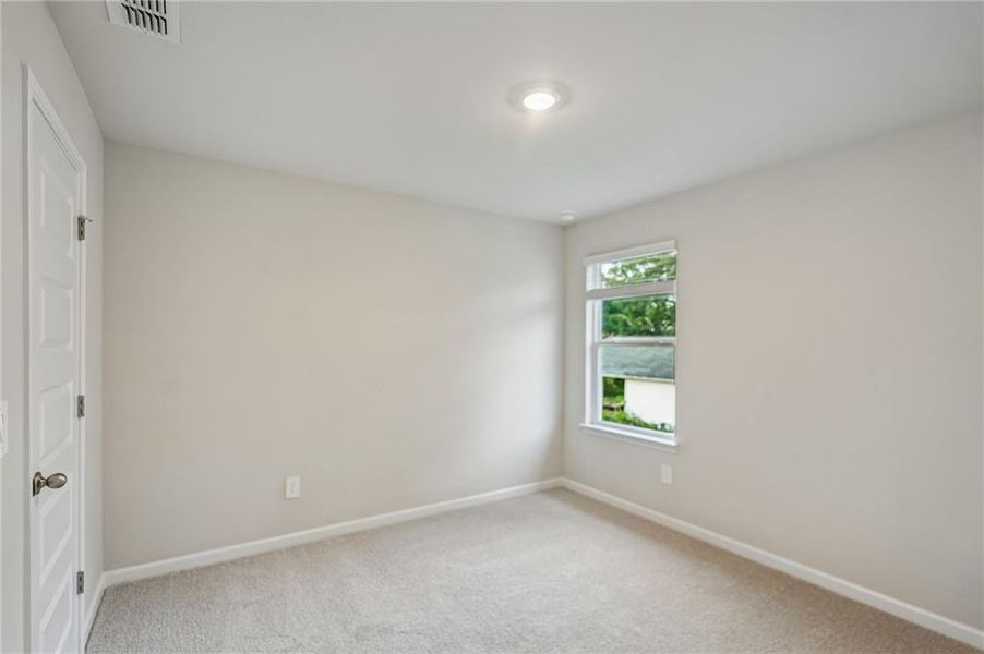Spacious, unfurnished interior of a new home in Martin Springs - Estate Series, Lawrenceville (Image 23).