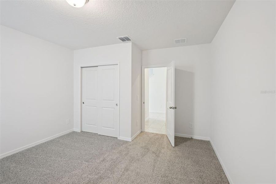 Spacious, unfurnished interior of a new home in Crosswinds - Classic Series, Haines City (Image 13).