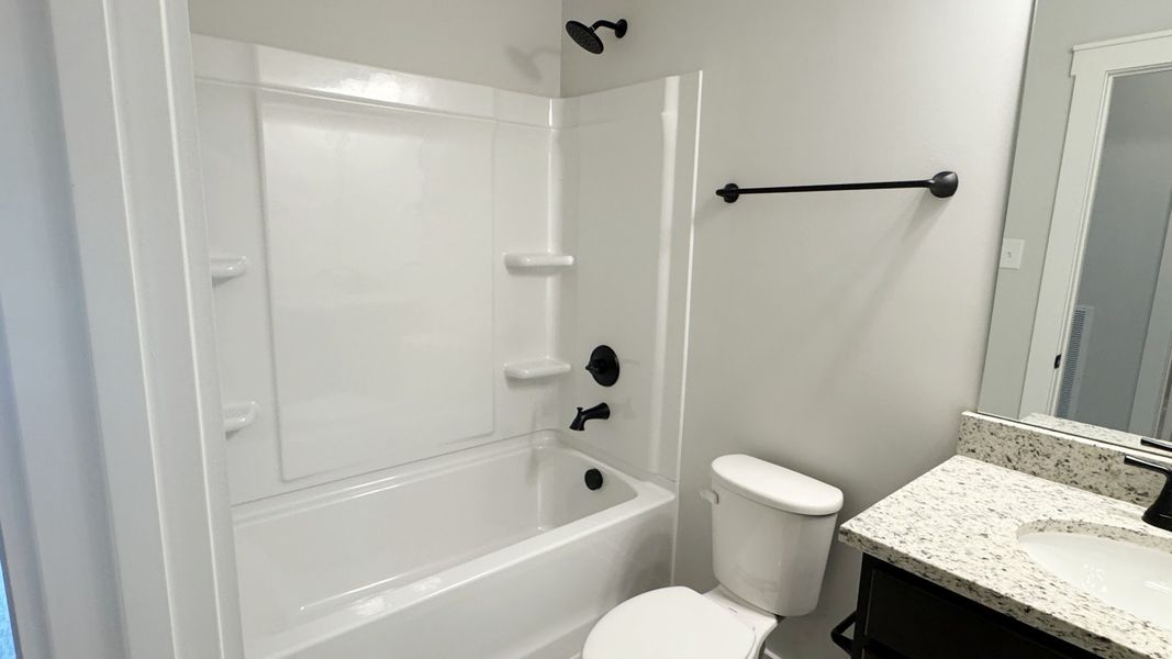 Furnished interior view inside a new home in The Greens at Legacy Townhomes, Springfield (Image 8).