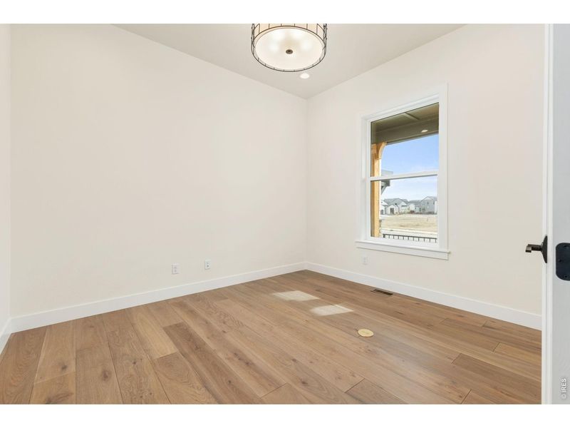 Spacious, unfurnished interior of a new home in RainDance, Windsor (Image 40).
