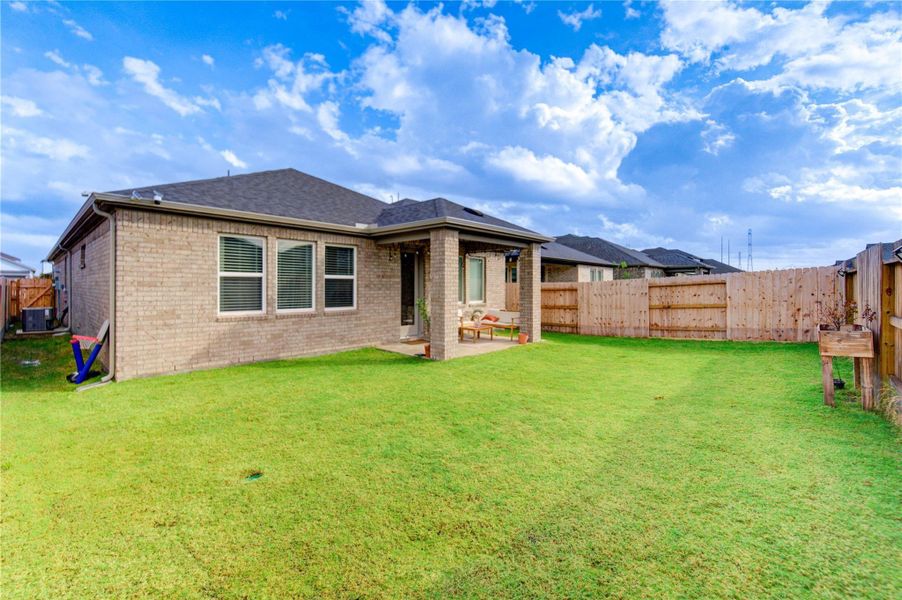 The landscaped backyard is the perfect place on summer mornings to step out and capture stunning sunrise and sunset views and embrace natural light.