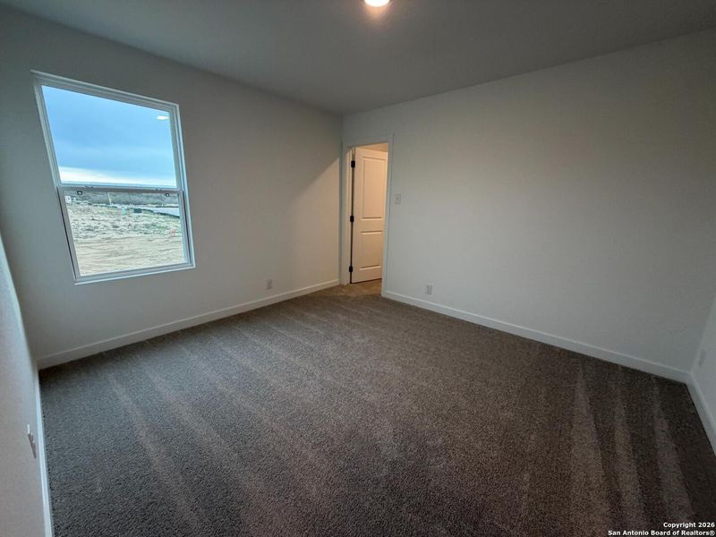 Spacious, unfurnished interior of a new home in The Preserve at the Wilder, Adkins (Image 24).